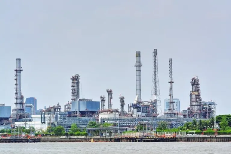 large oil refinery plant by the river