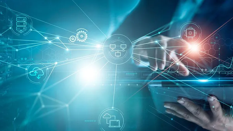 A person using a digital device, surrounded by futuristic data visualizations and technology icons, symbolizing innovation and connectivity.