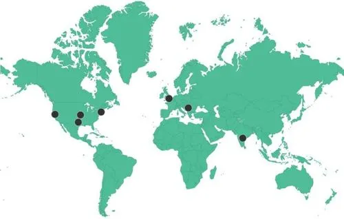 A stylised world map in green, with the continents filled solid against a plain background.